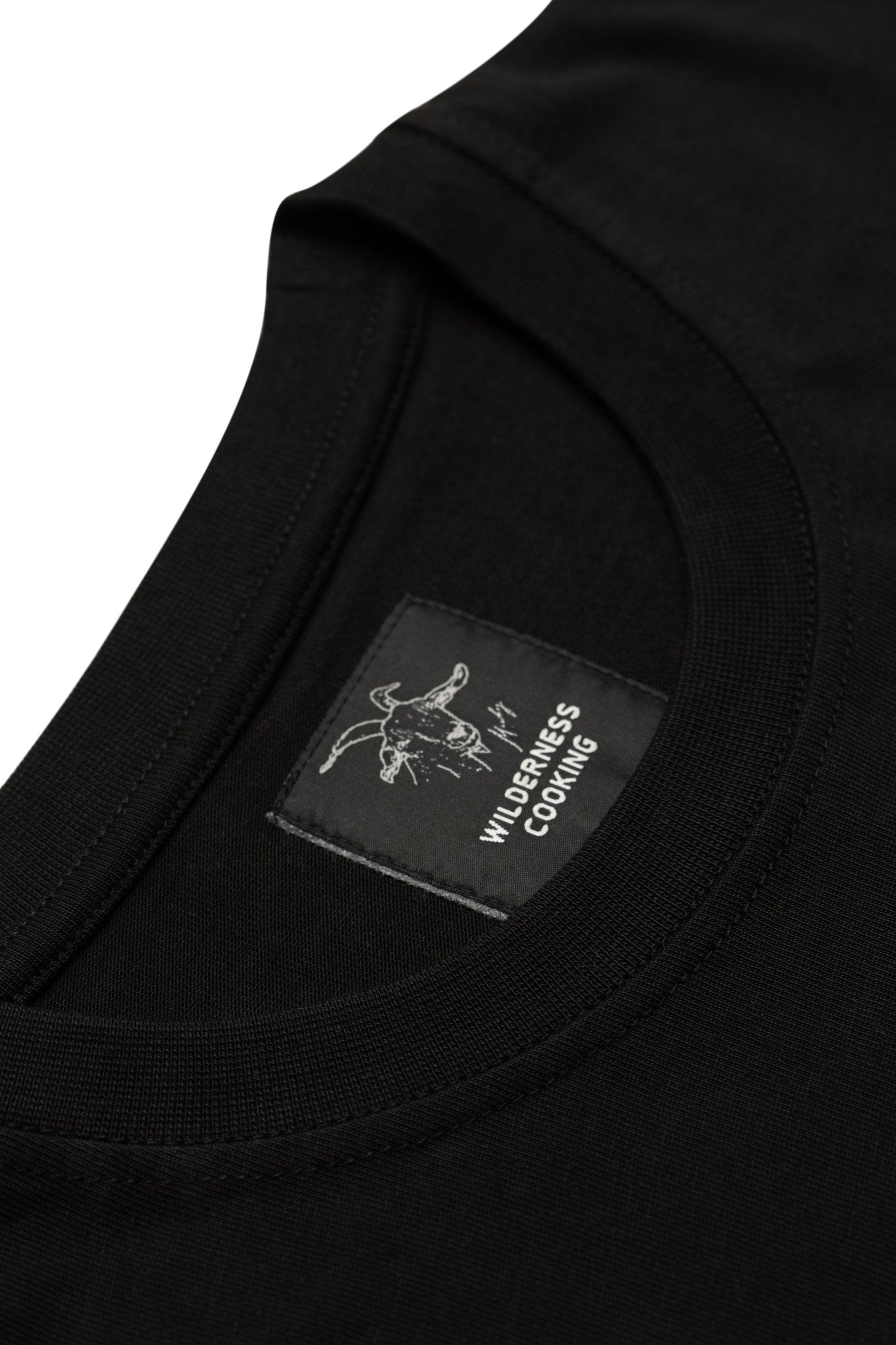 EU Mickey the Goat Inspired Black T-Shirt with Side Wilderness Cooking Logo - Home&Wild